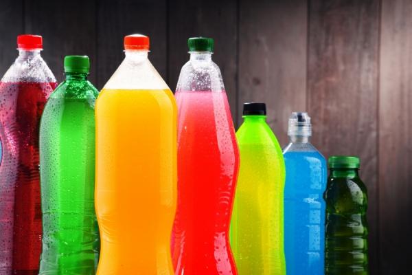 An assortment of colorful sugary beverage bottles